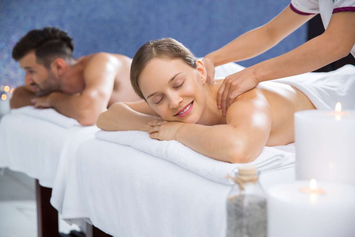 Couple enjoying a couple's treatment at a spa